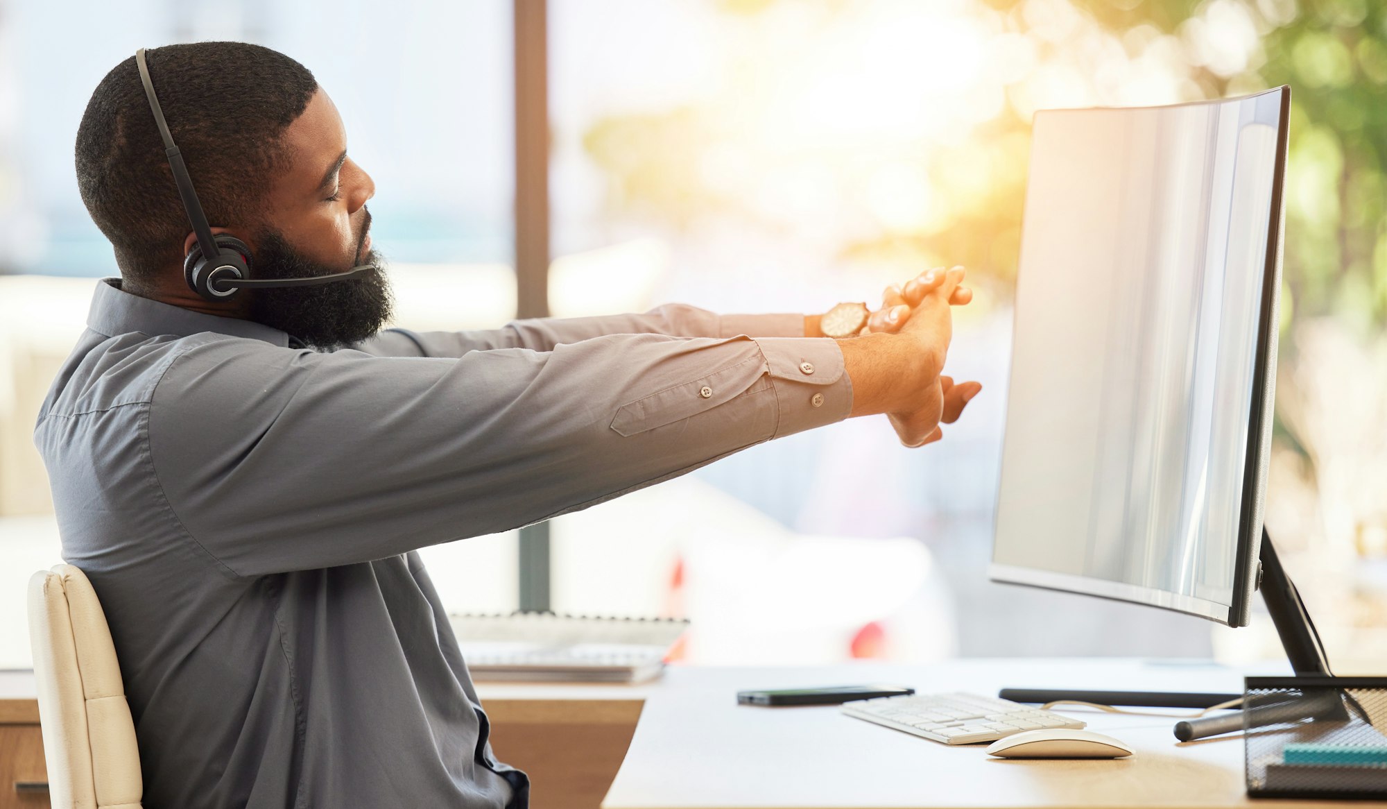 Call center computer, customer service or black man stretching for ergonomic health in CRM telemark