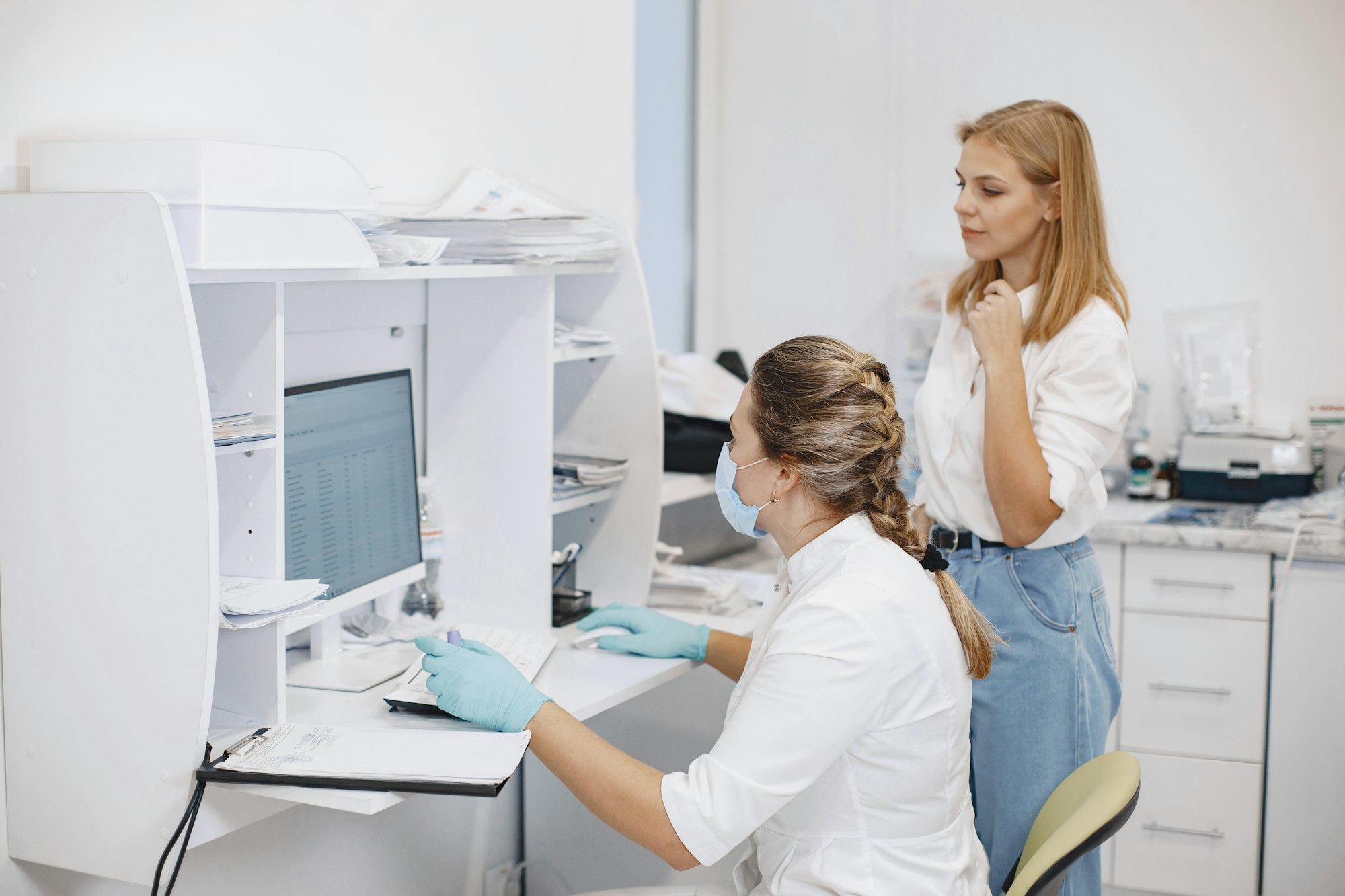 Doctor checks coronavirus test with patient