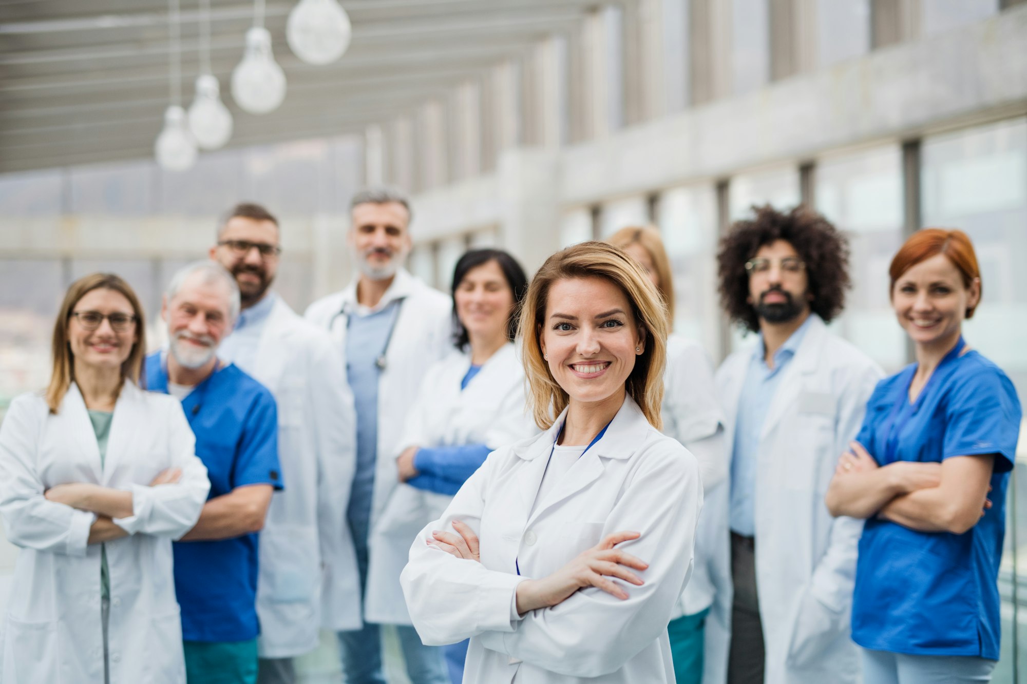 Group of doctors looking at camera, corona virus concept.