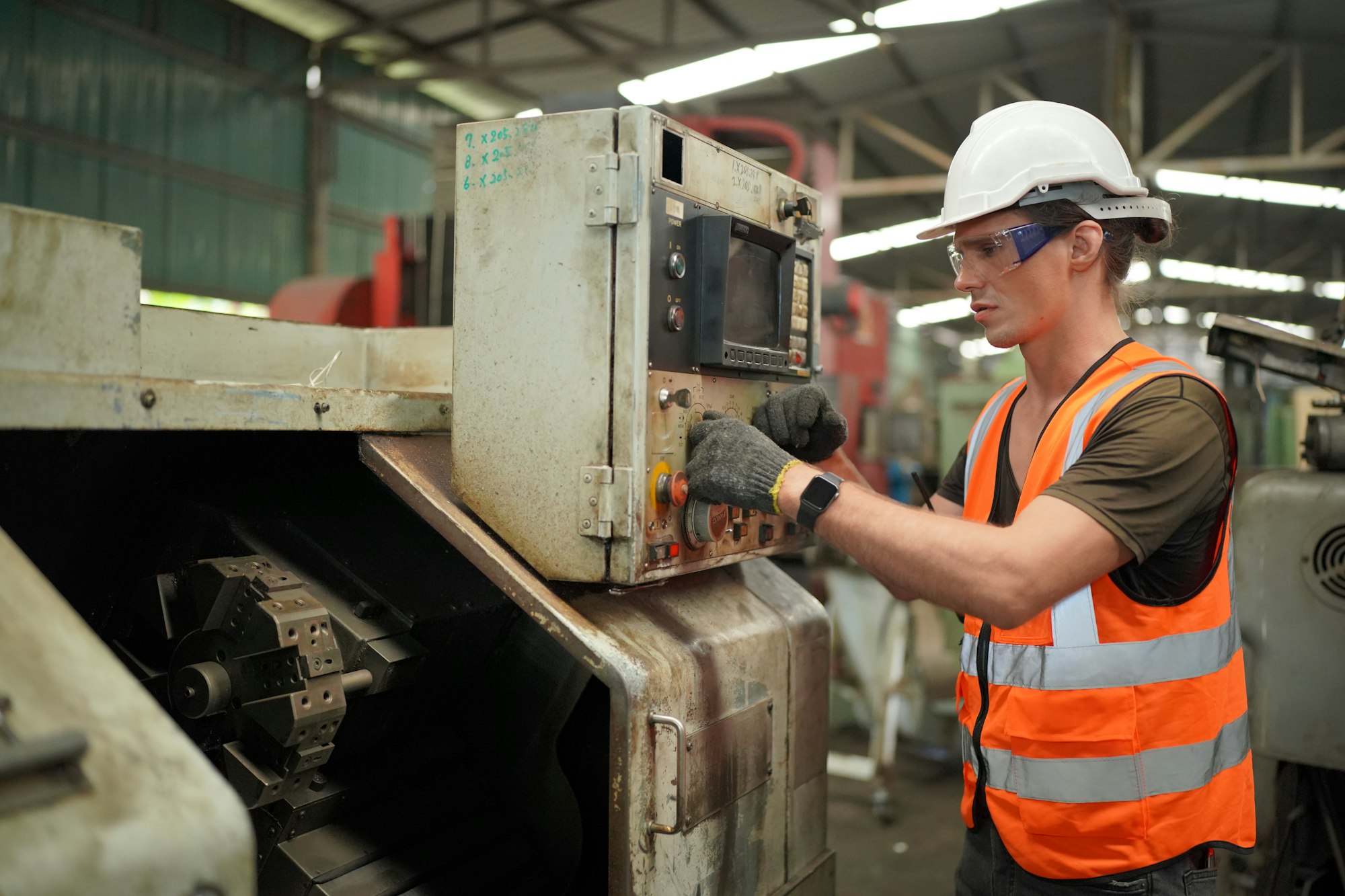 industrial factory employee working in metal manufacturing industry