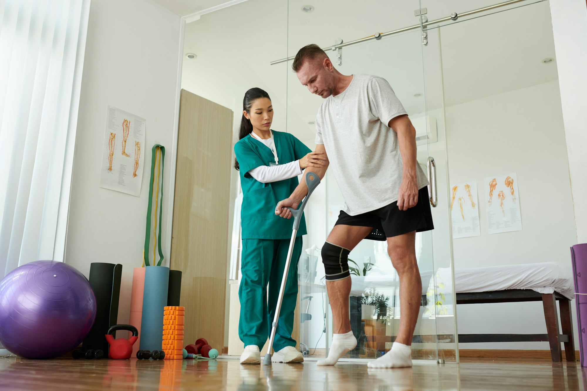 Nurse Supporting Patient Learning to Walk