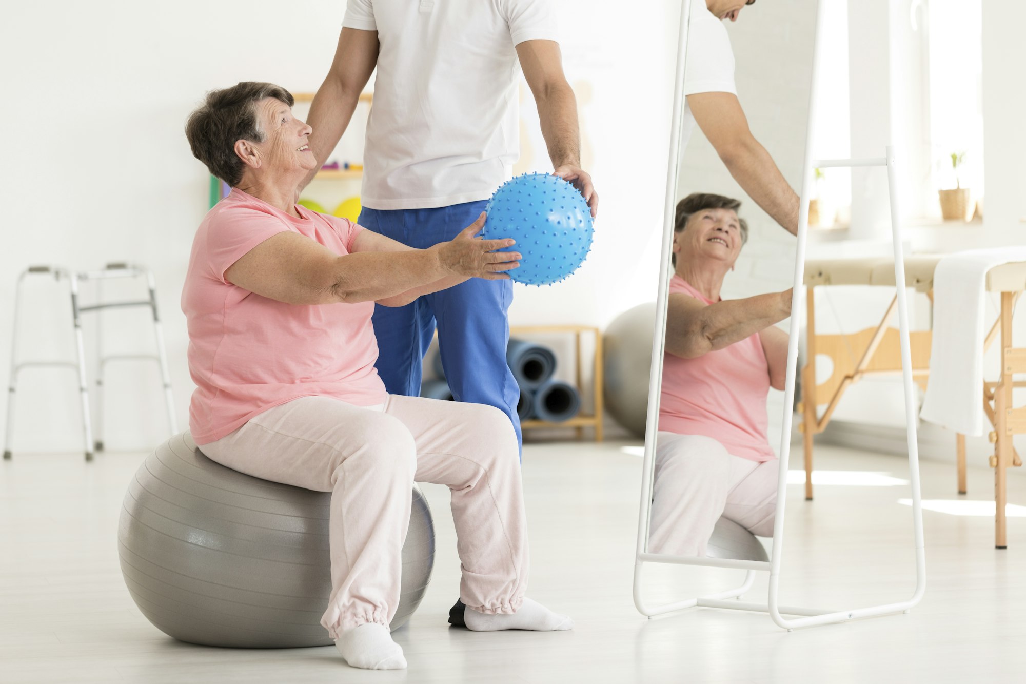 Senior woman on exercise ball