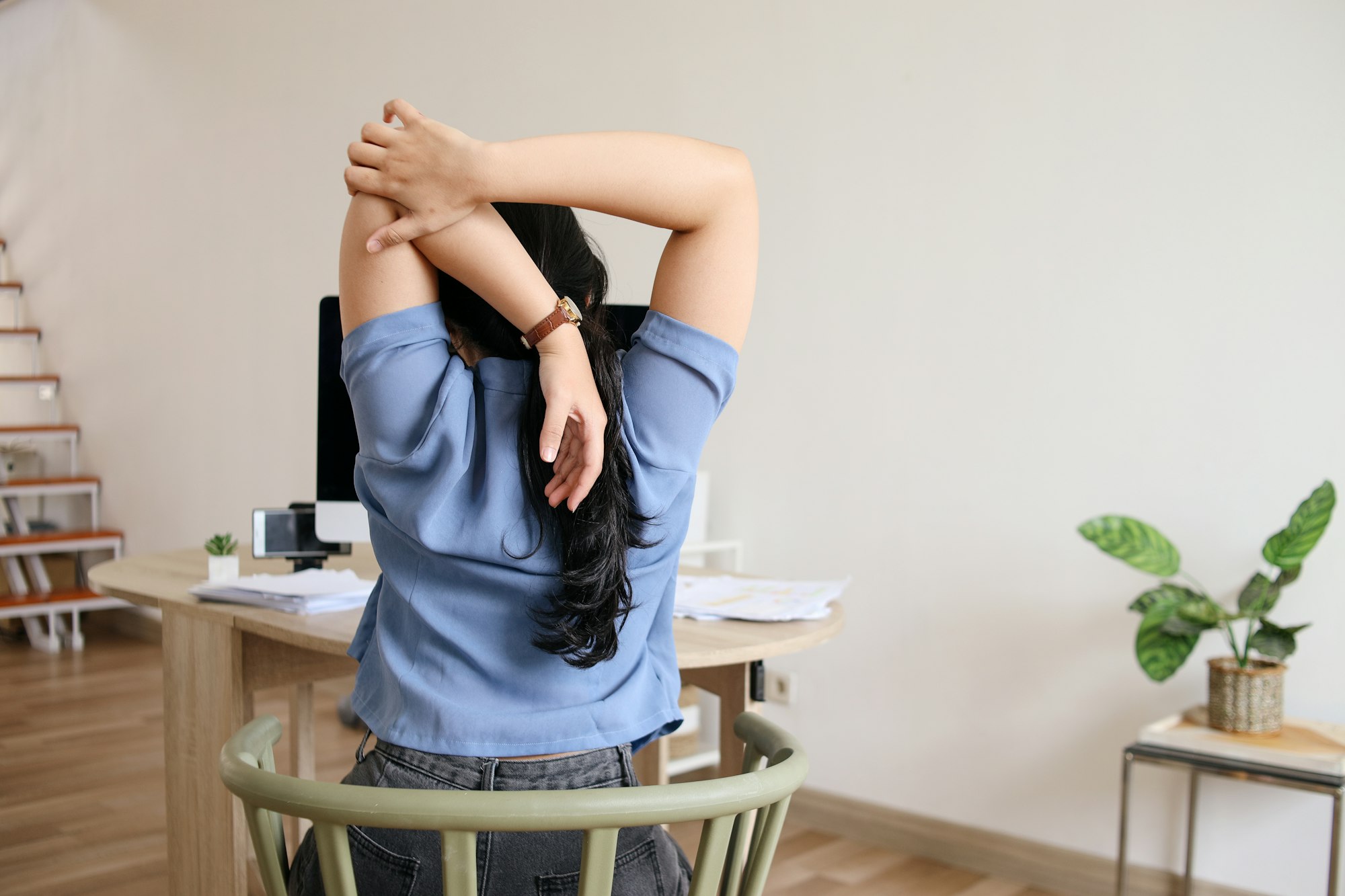 Stretching body at office